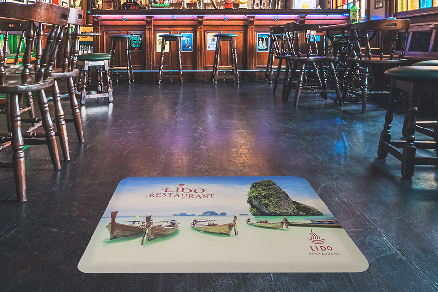 Custom logo mat in restaurant setting — Lido Restaurant